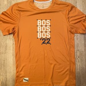 Tracksmith short sleeve Boston 22 shirt.
